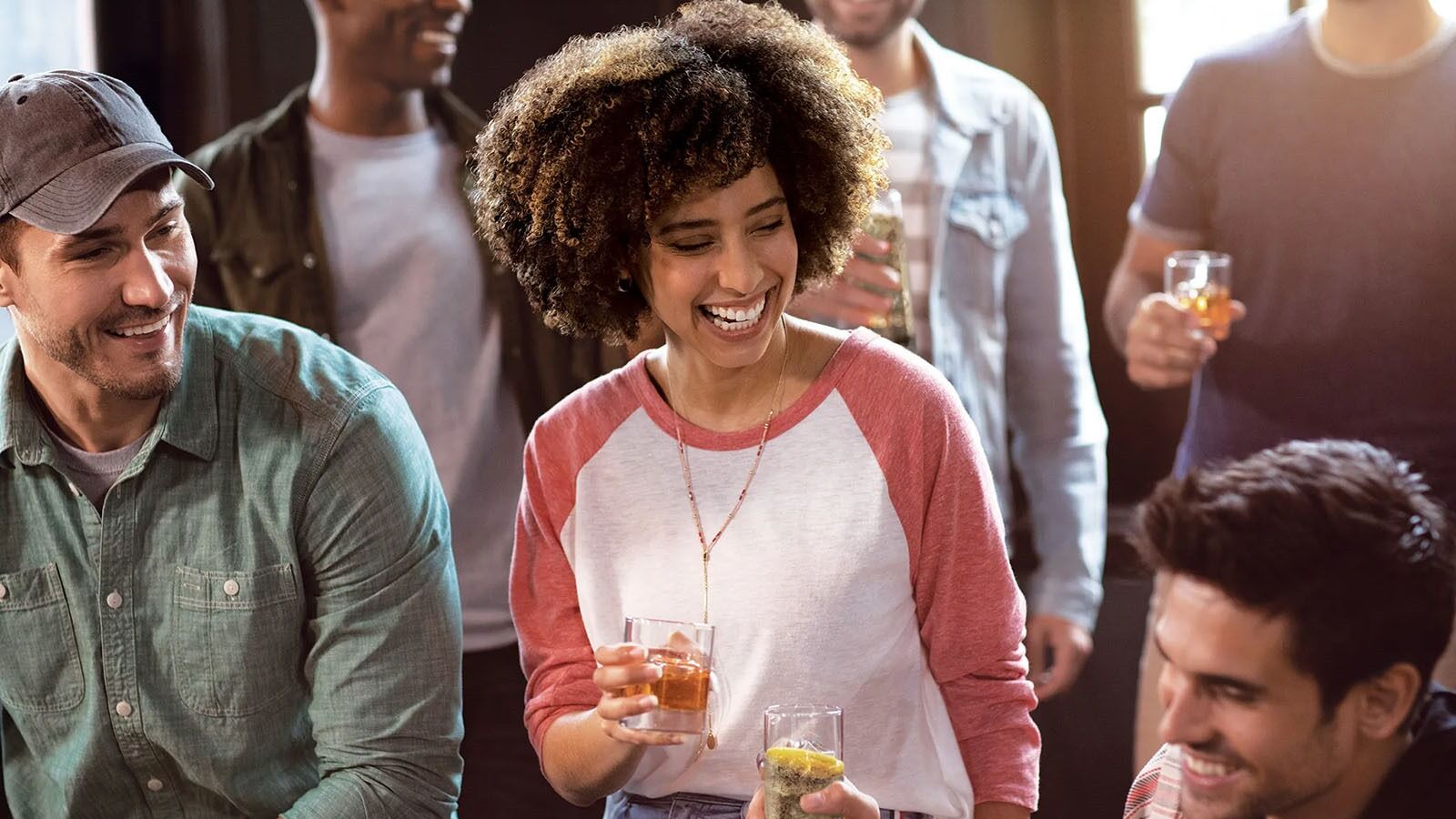 Woman Holding Pineapple Bourbon Bottle Outdoor Celebration Smile Jim Beam