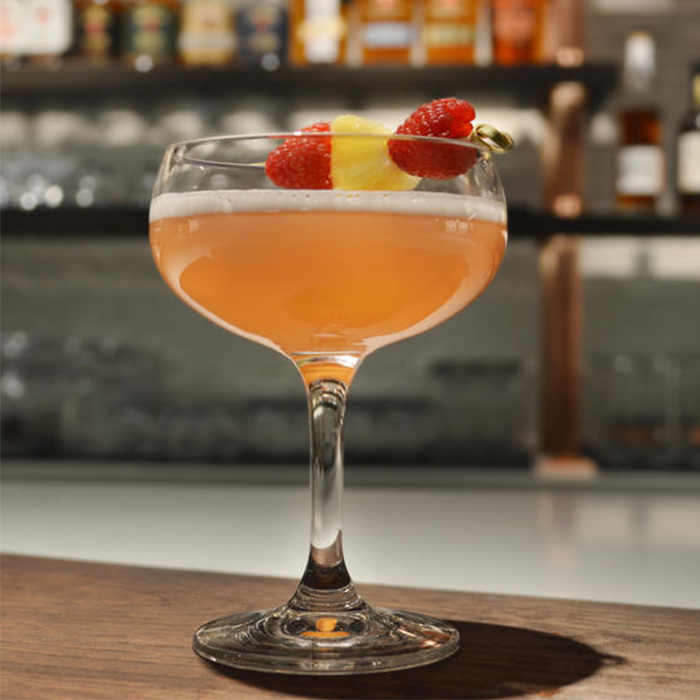 Spring Breeze Cocktail Coupe Glass Raspberry Garnish Citrus Twist Bar Jim Beam