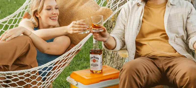 People enjoying bourbon Jim Beam whiskey 