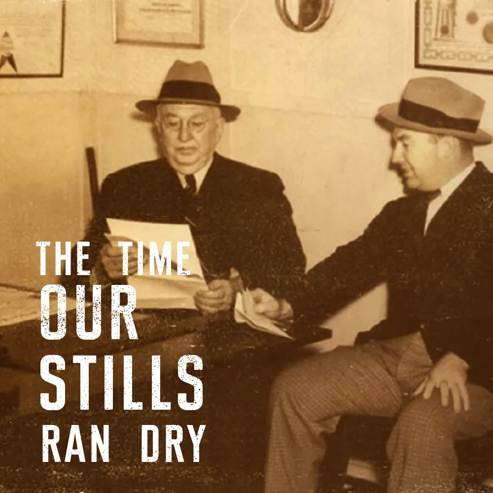 Two Men at a table discussing