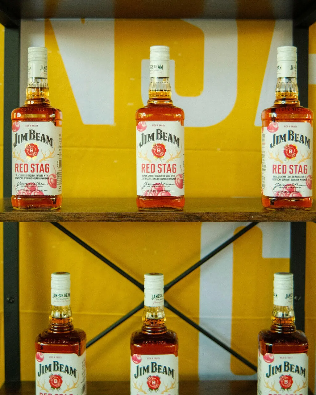 Jim Beam red stag flavor bottles presented at the Kelce Jam 2024 festival