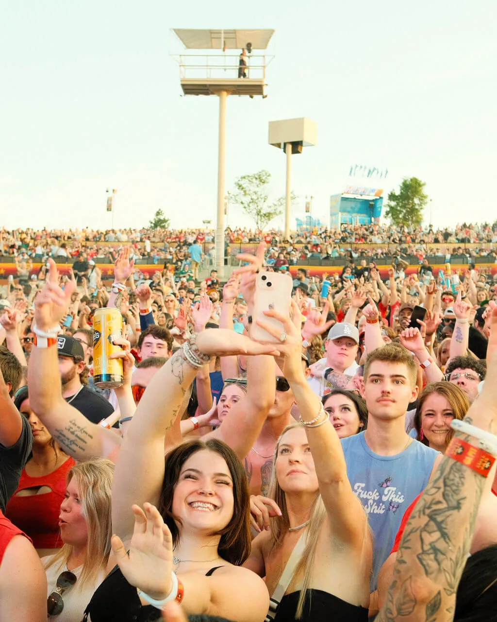People enjoying the concerts at the Kelce Jam festival by Jim Beam