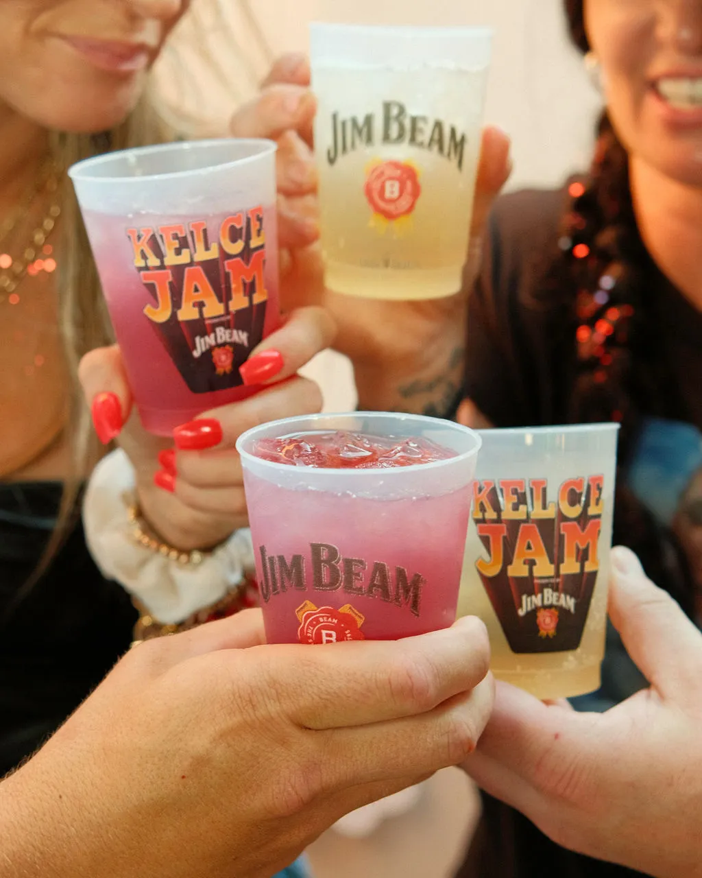 Different Jim Beam flavors in festival glasses with ice