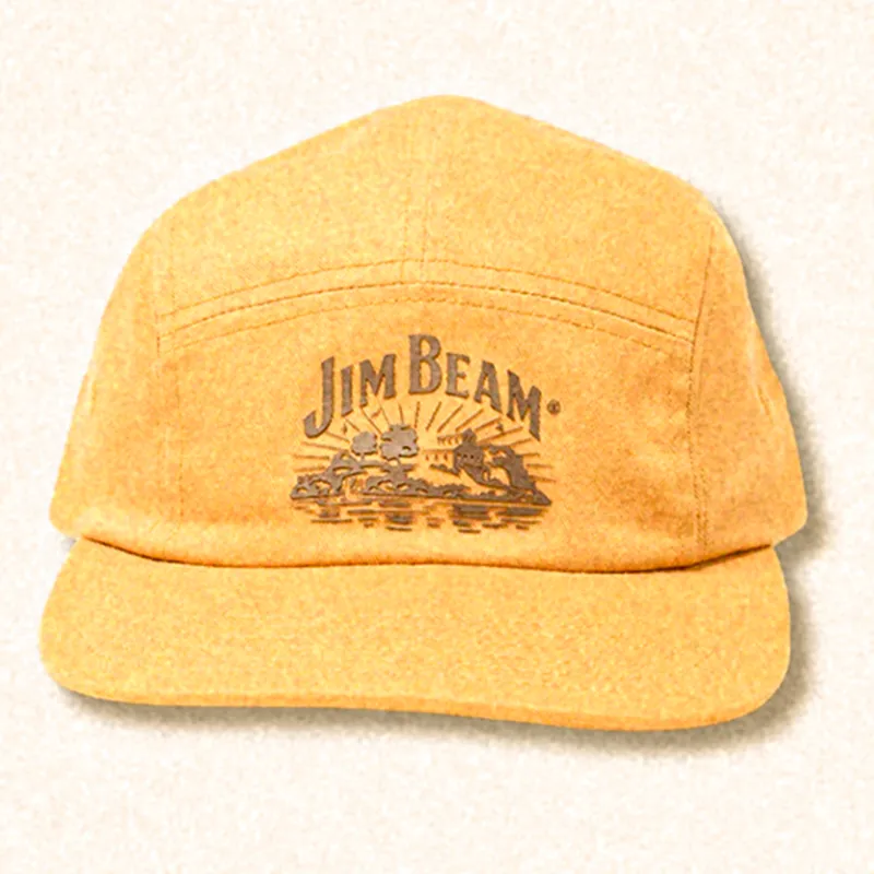 Yellow cap with "Jim Beam" logo on textured background.