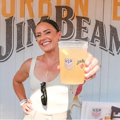 Woman Holding Cup USA Logo Front Jim Beam