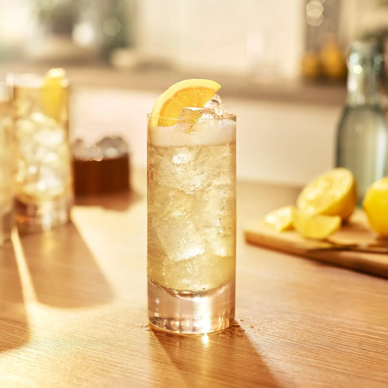 Highball Cocktail Glass Ice Orange Slice Wooden Bar Counter Jim Beam