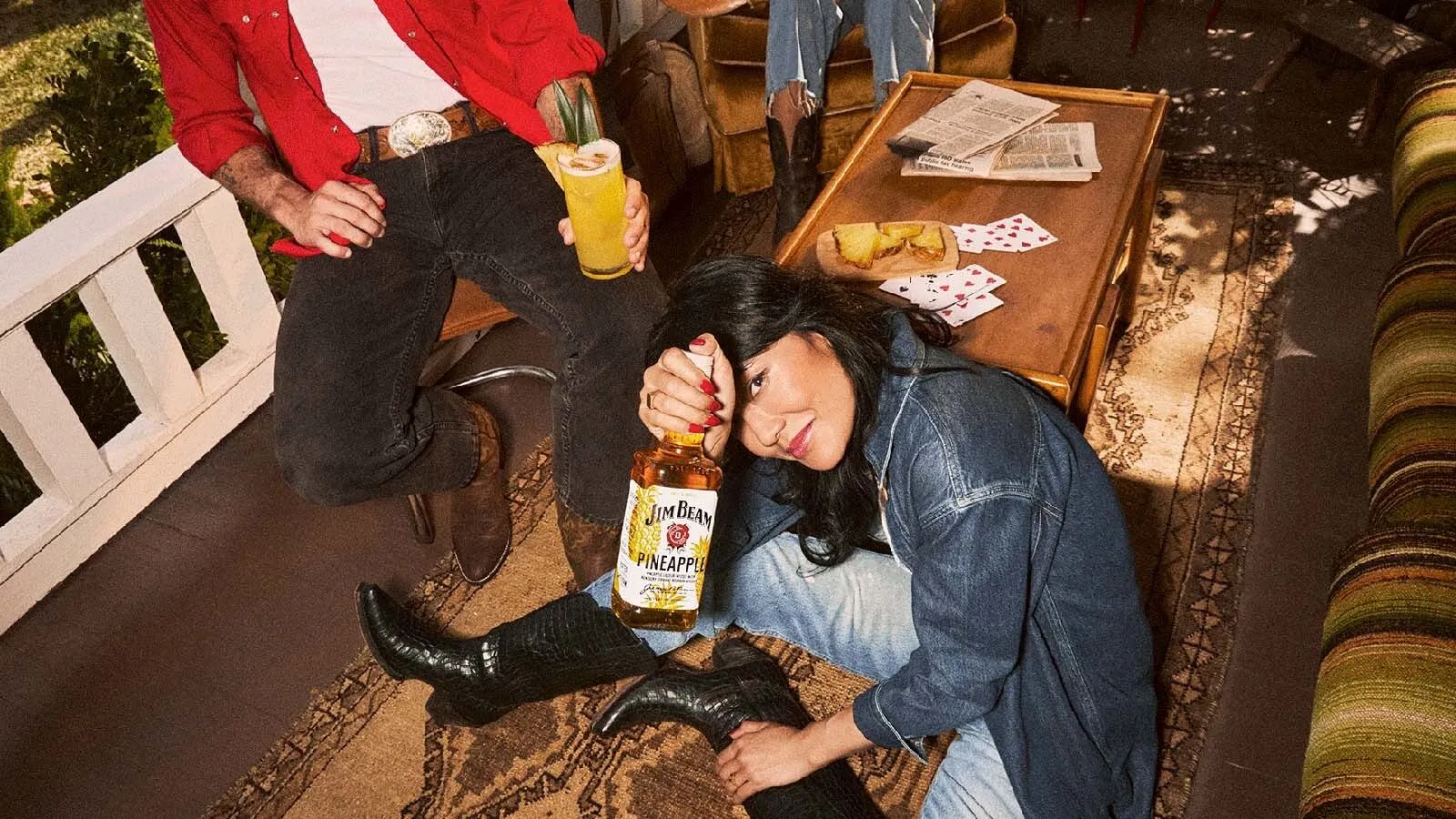 Living Room Party Woman Holding Pineapple Bourbon Bottle Cards Table Jim Beam