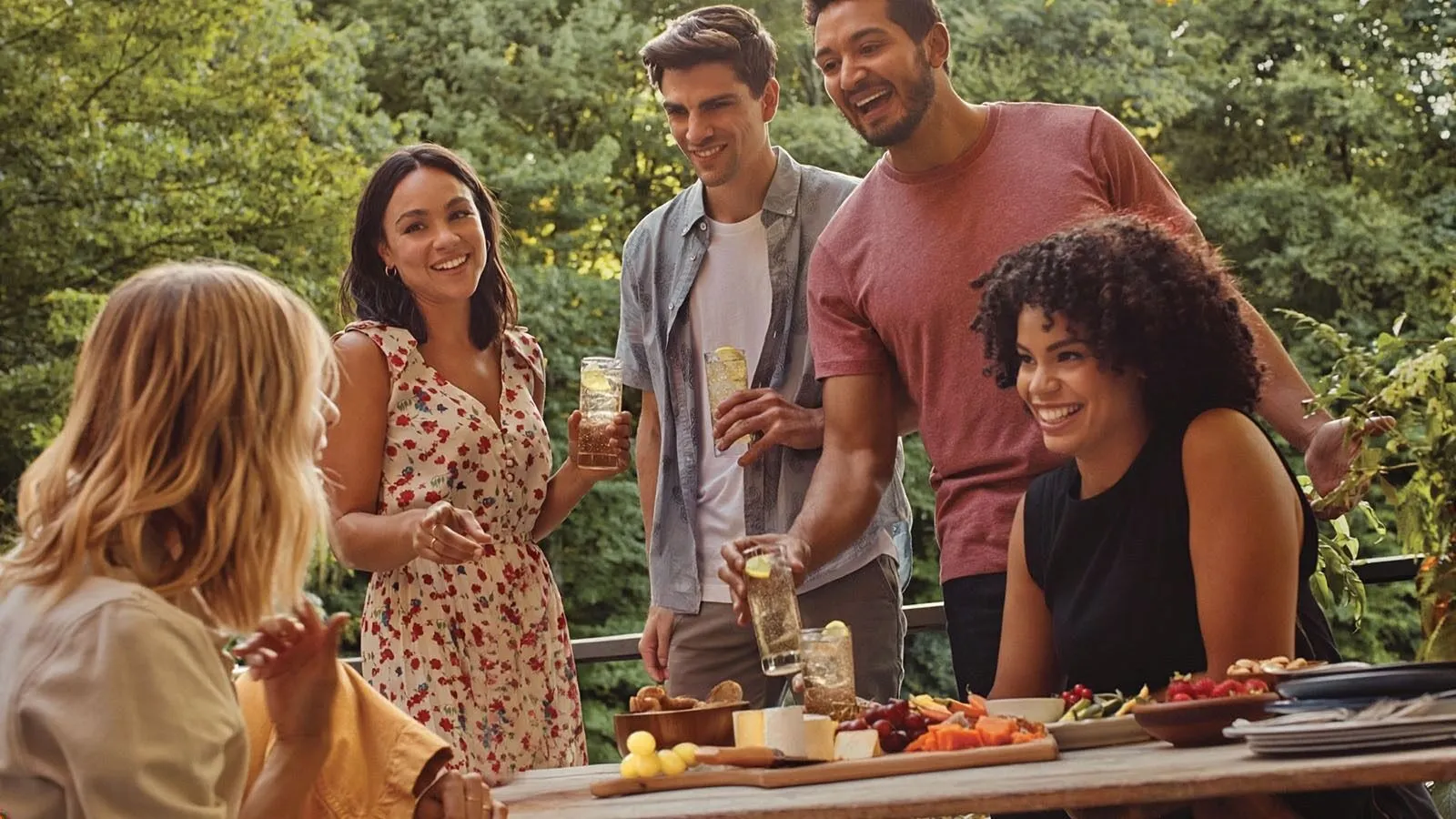 Outdoor friends cocktails snacks table jim beam image